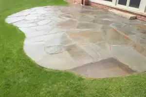 A freeform stone patio.