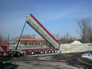A large truck delivering a load of salt.