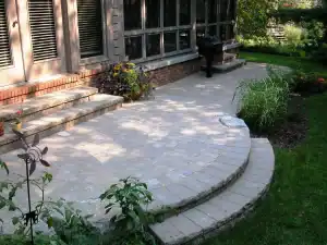 Block steps and curved patio.