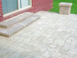 Paved patio with block steps.