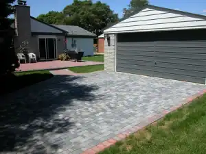Driveway with interlocking stone paving for homes and outdoor spaces.
