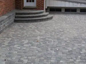 Beautifully installed gray paver driveway with steps in San Marino.