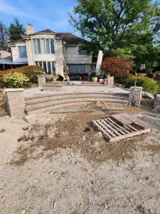 Stone patio construction in progress.