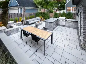 Outdoor kitchen and seating area with modern design in San Marino project.