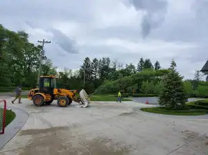 Outdoor landscaping and paving work in progress.