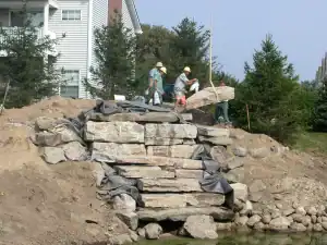 Outdoor stone staircase construction in San Marino neighborhood.